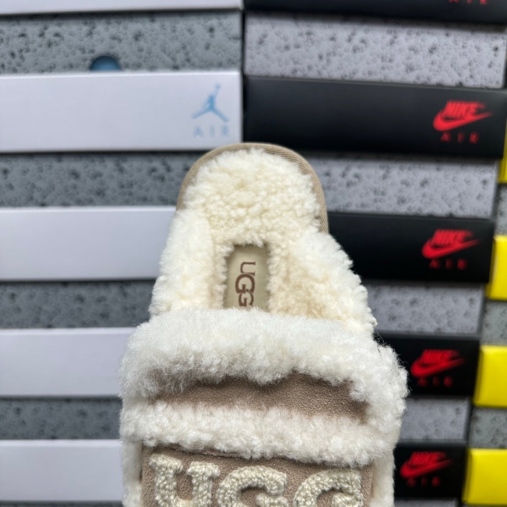 UGG Shearling Slide – Sand Suede Open-Toe Sandal with Sculptural Curly Shearling Knot Strap