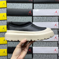 UGG Lowmel – Black Pebbled Leather Slip-On with Cream SugarSole & Sheepskin Lining