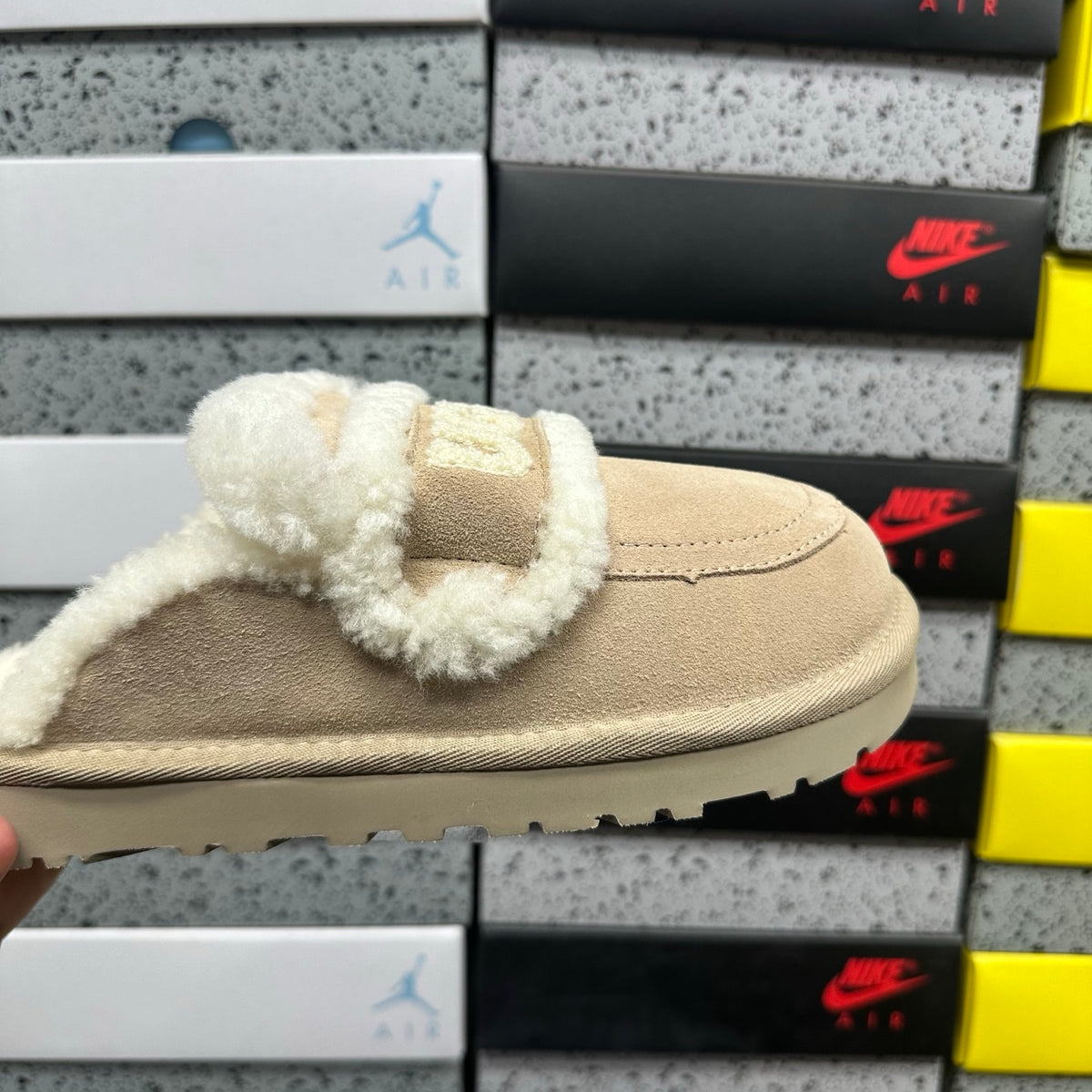 UGG Shearling Slide – Sand Suede Open-Toe Sandal with Sculptural Curly Shearling Knot Strap