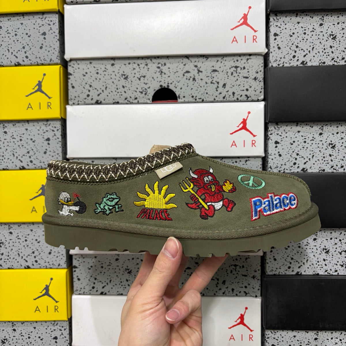 UGG × Palace Skateboards Tasman Slipper – Olive Suede with Embroidered Graphic Patches & Herringbone Braid Trim