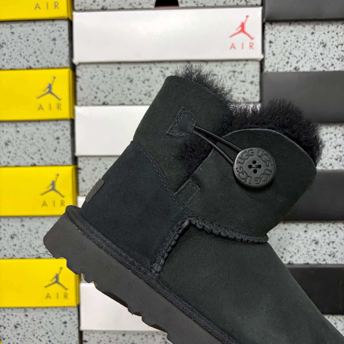 UGG Bailey Button Mini Boot – Black Suede