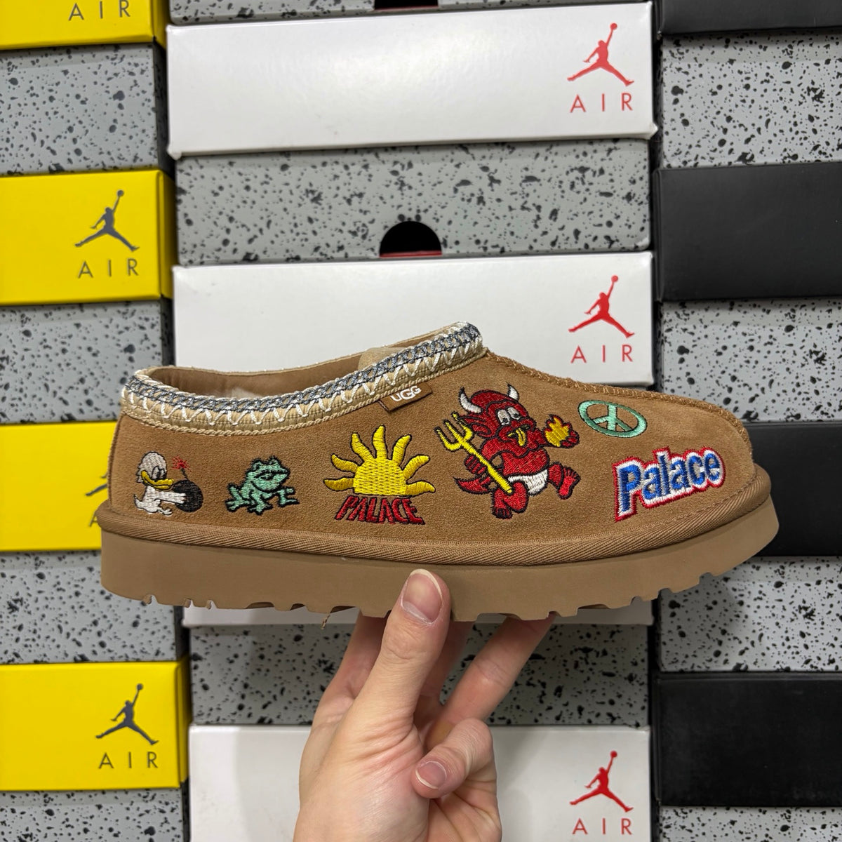 UGG × Palace Skateboards Tasman Slipper – Chestnut Suede with Embroidered Graphic Patches & Metallic Braid Trim