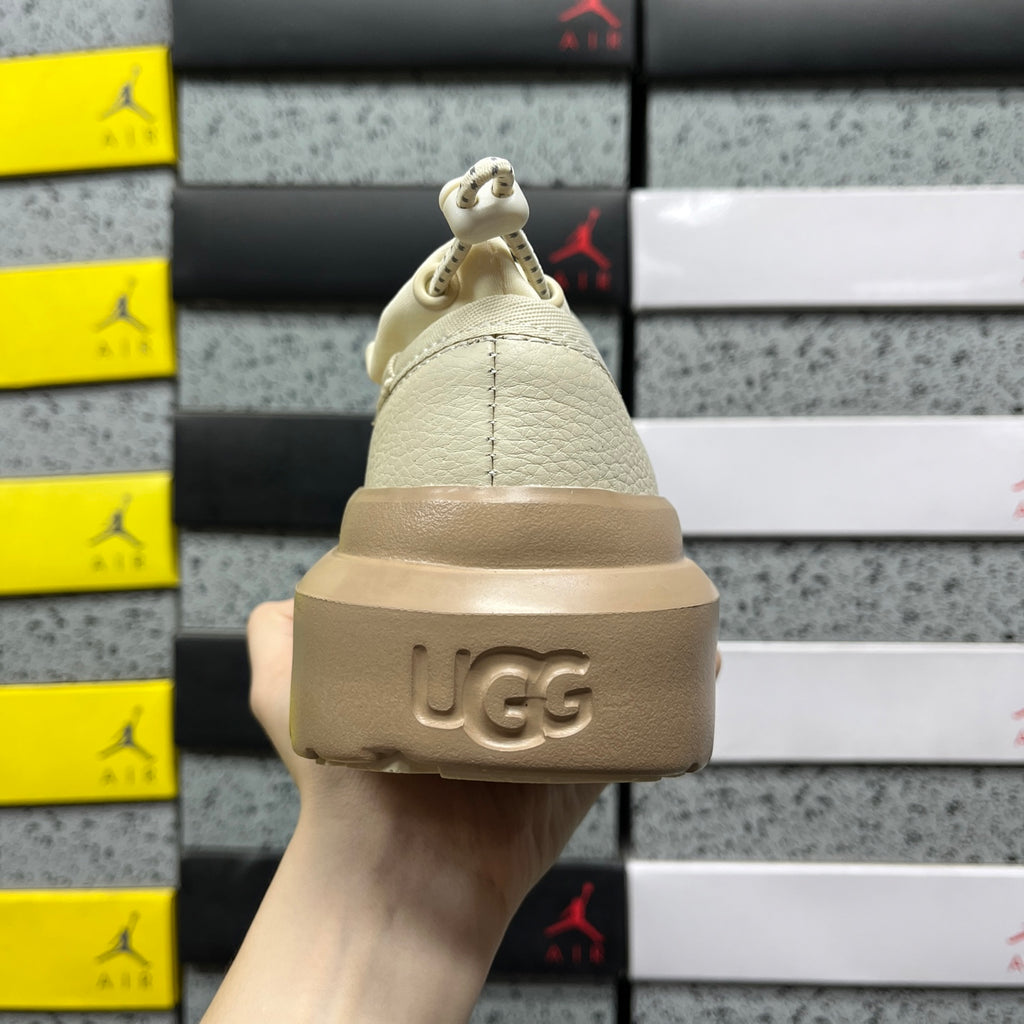 UGG Lowmel – Cream Pebbled Leather Slip-On with Sheepskin Lining & Tonal SugarSole