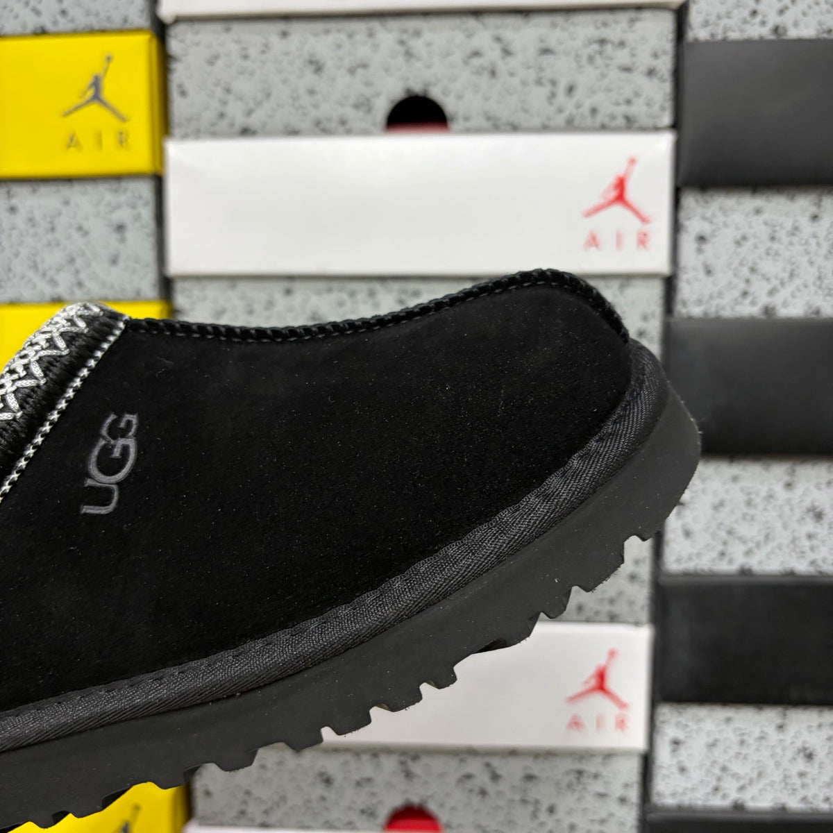 UGG Tazz Slipper – Black Suede Open-Back Platform Mule with Black & White Herringbone Braid Trim