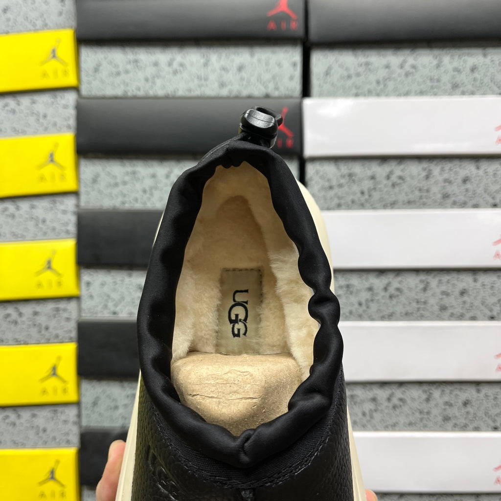 UGG Lowmel – Black Pebbled Leather Slip-On with Cream SugarSole & Sheepskin Lining
