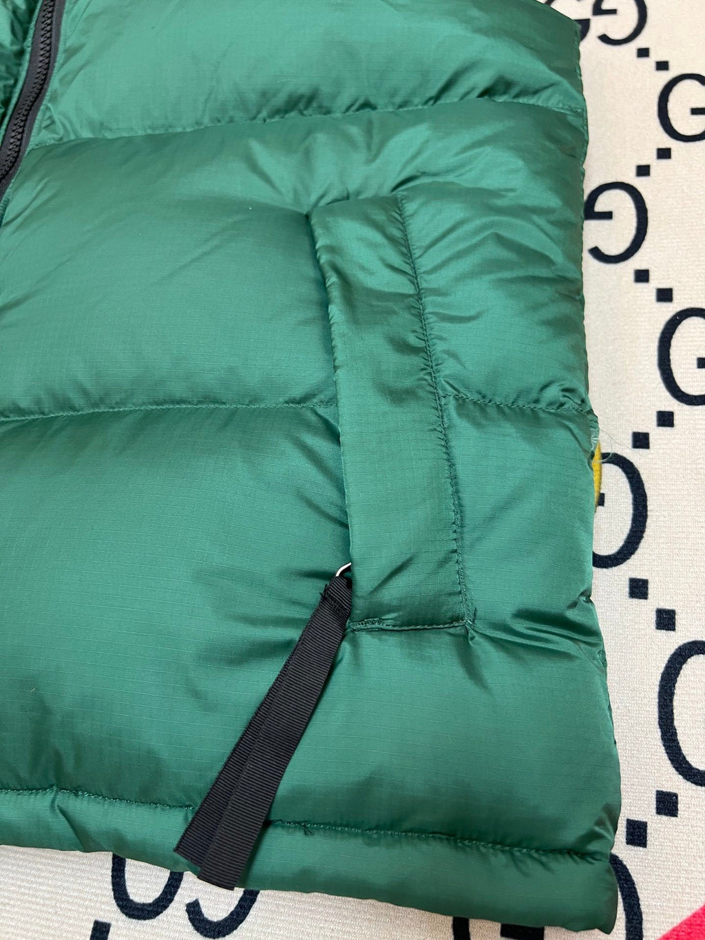 The North Face Puffer Vest in Green and Black with Stand Collar