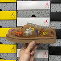 UGG × Palace Skateboards Tasman Slipper – Chestnut Suede with Embroidered Graphic Patches & Metallic Braid Trim