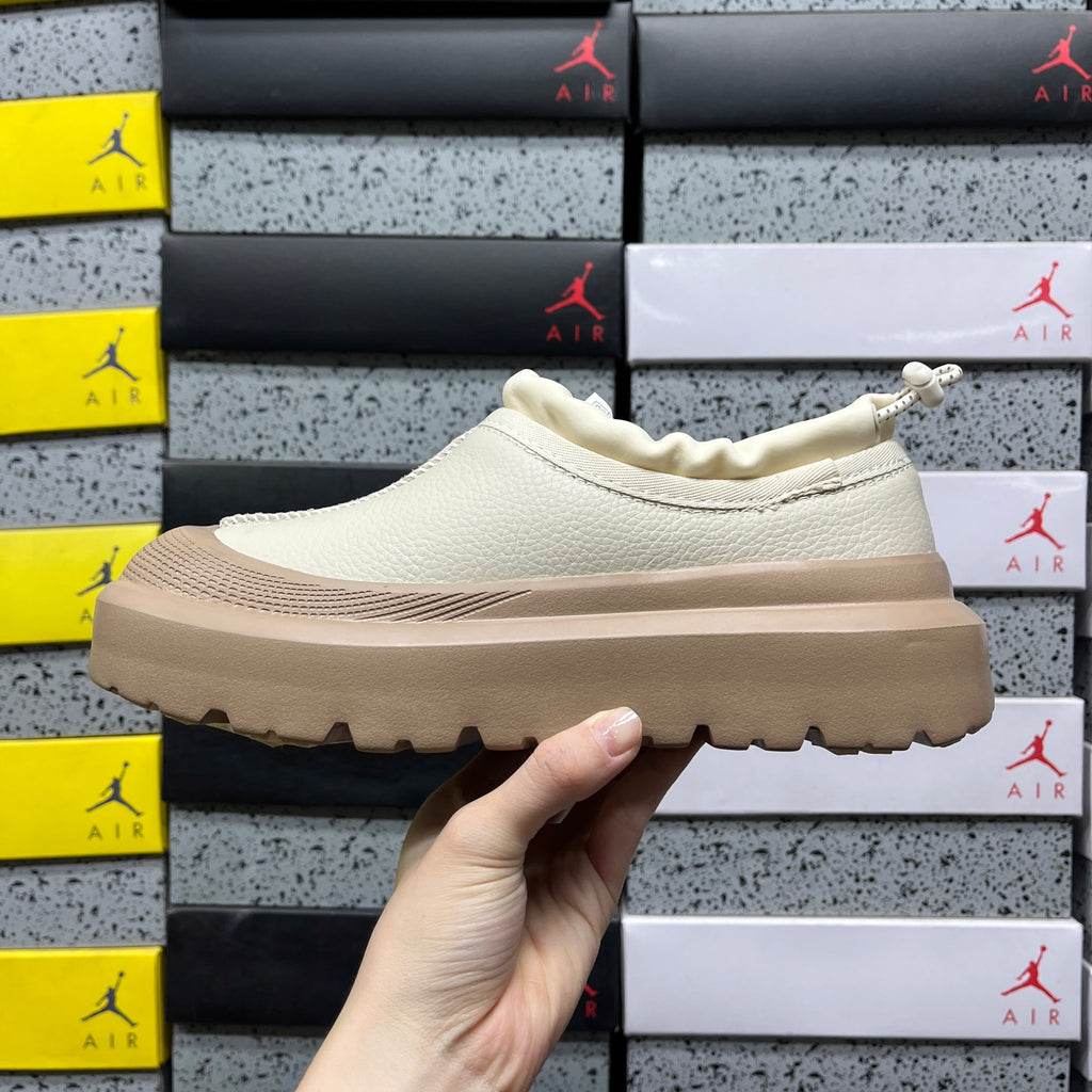 UGG Lowmel – Cream Pebbled Leather Slip-On with Sheepskin Lining & Tonal SugarSole