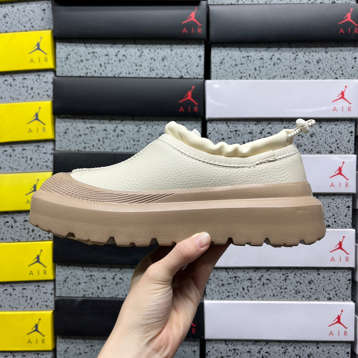 UGG Lowmel – Cream Pebbled Leather Slip-On with Sheepskin Lining & Tonal SugarSole