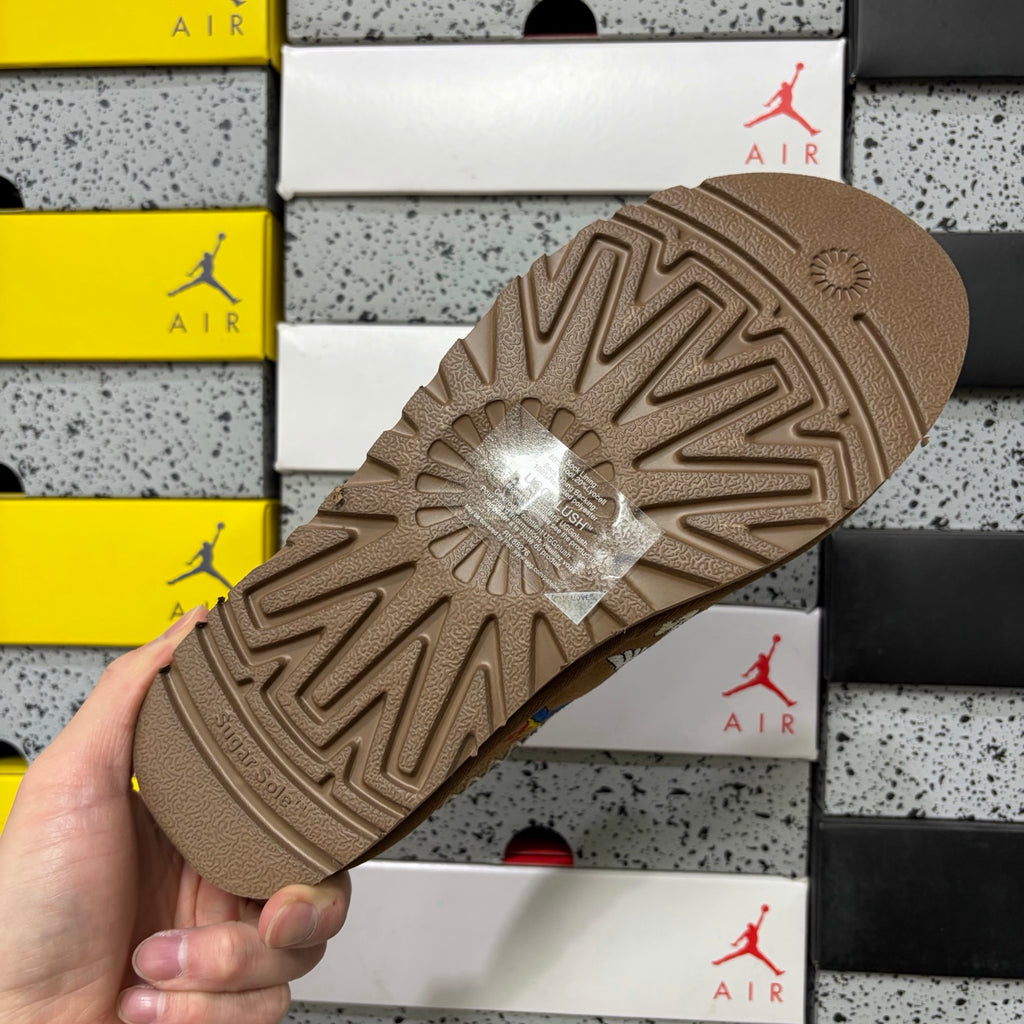 UGG × Palace Skateboards Tasman Slipper – Chestnut Suede with Embroidered Graphic Patches & Metallic Braid Trim
