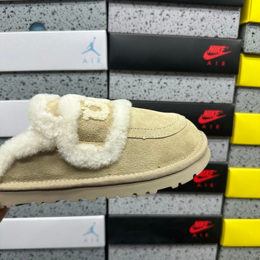 UGG Cozee Squish Slide – Sand Suede Open-Toe Sandal with Cream Shearling Knot Strap & Tonal Lug Sole