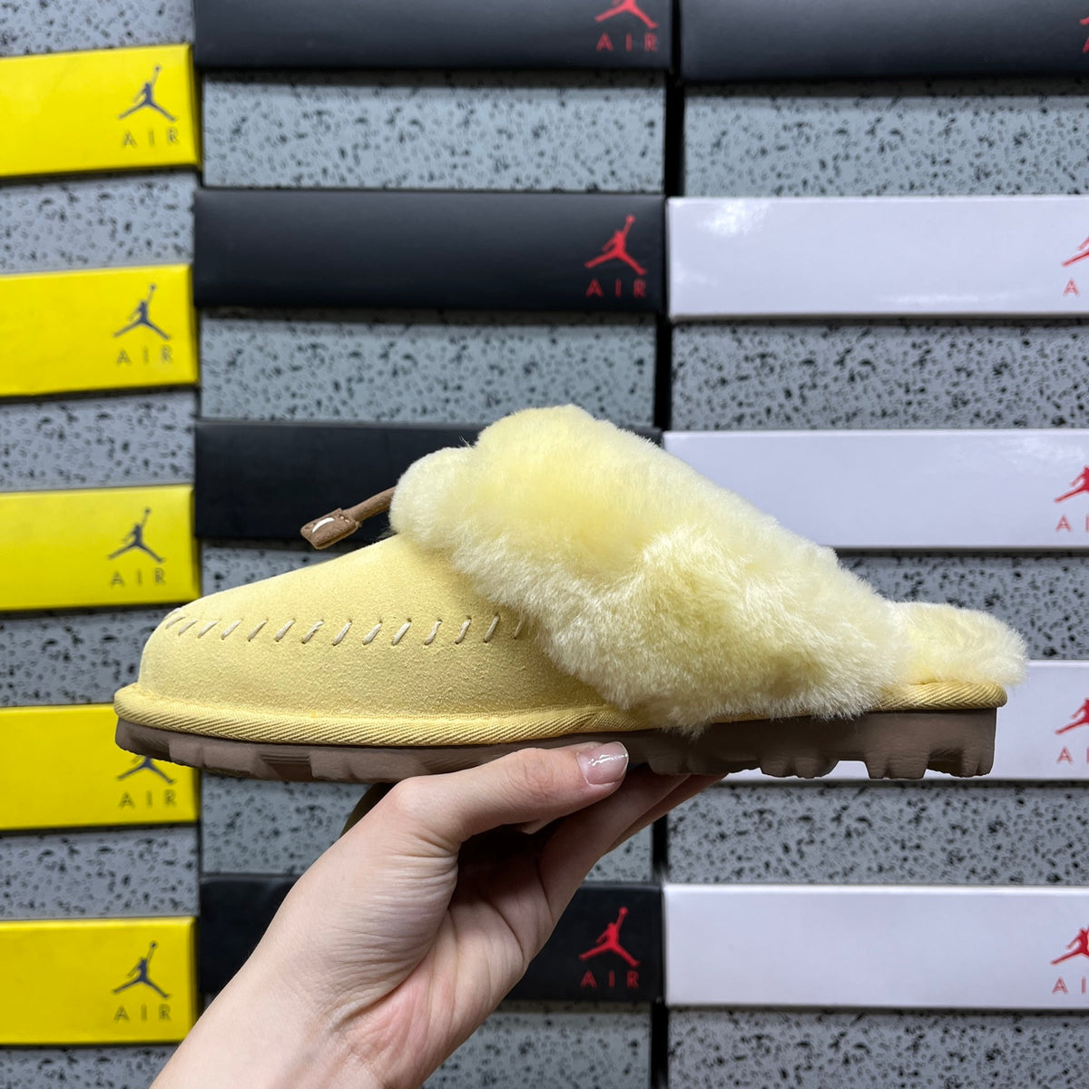 UGG Coquette Stitch – Maize Suede Open-Back Slipper with Sheepskin Cuff & Gold Logo Charm