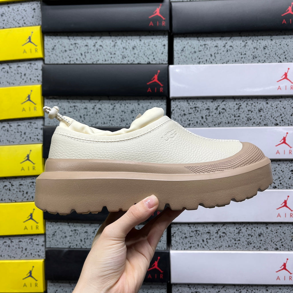 UGG Lowmel – Cream Pebbled Leather Slip-On with Sheepskin Lining & Tonal SugarSole