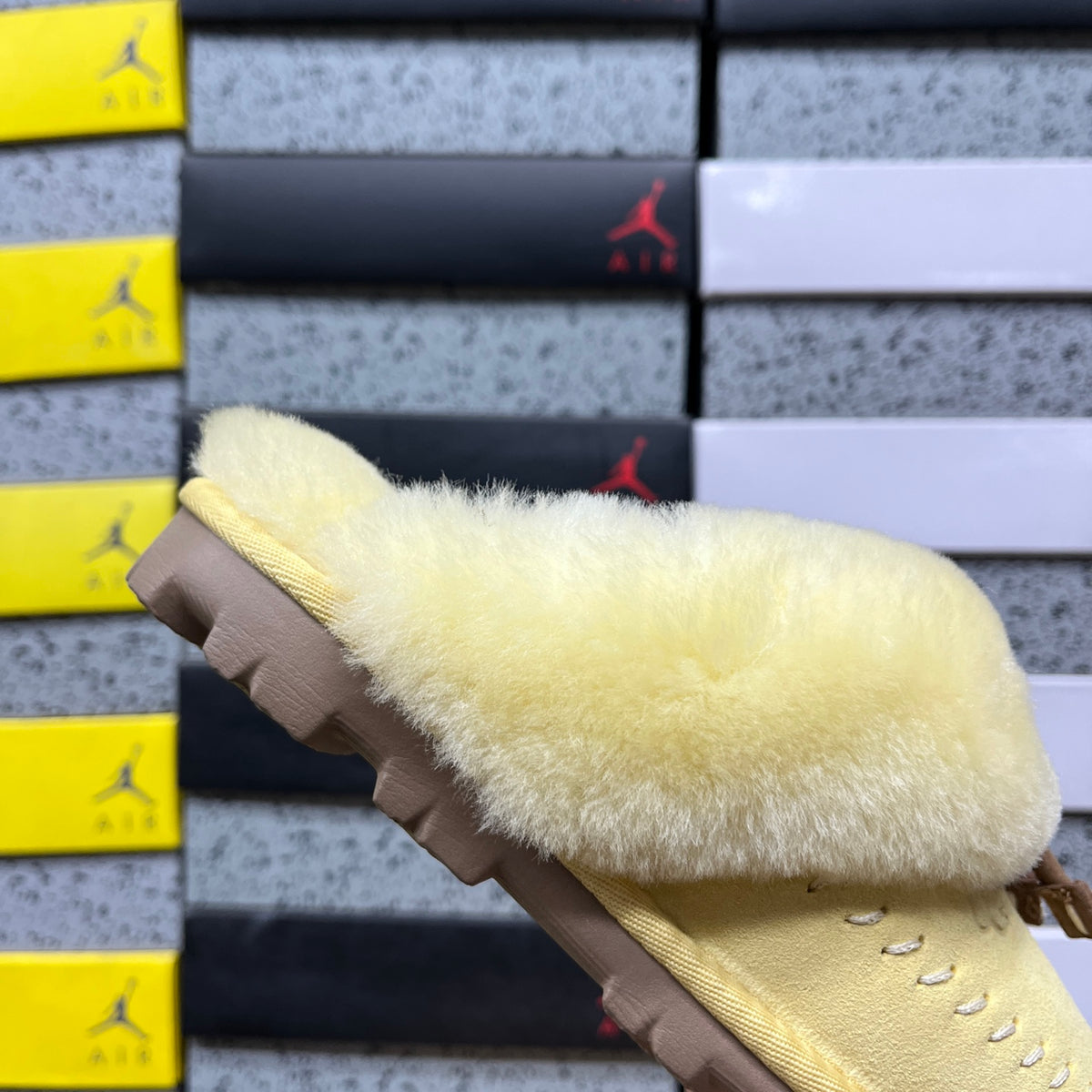 UGG Coquette Stitch – Maize Suede Open-Back Slipper with Sheepskin Cuff & Gold Logo Charm