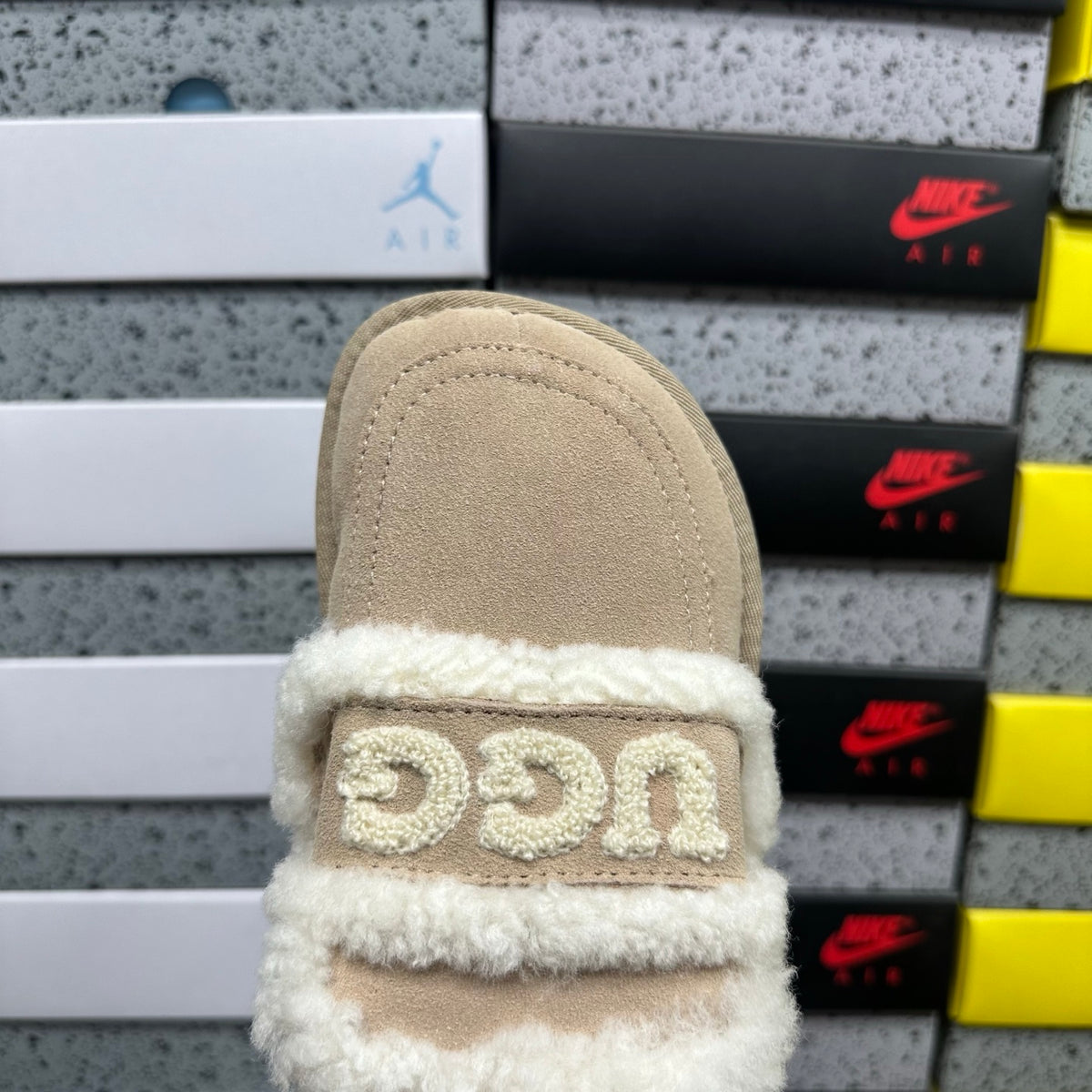 UGG Shearling Slide – Sand Suede Open-Toe Sandal with Sculptural Curly Shearling Knot Strap