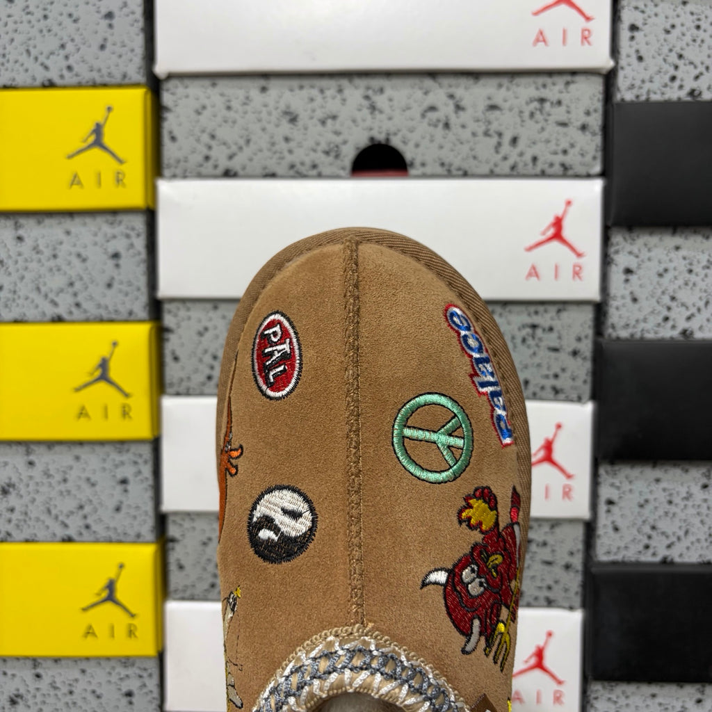 UGG × Palace Skateboards Tasman Slipper – Chestnut Suede with Embroidered Graphic Patches & Metallic Braid Trim