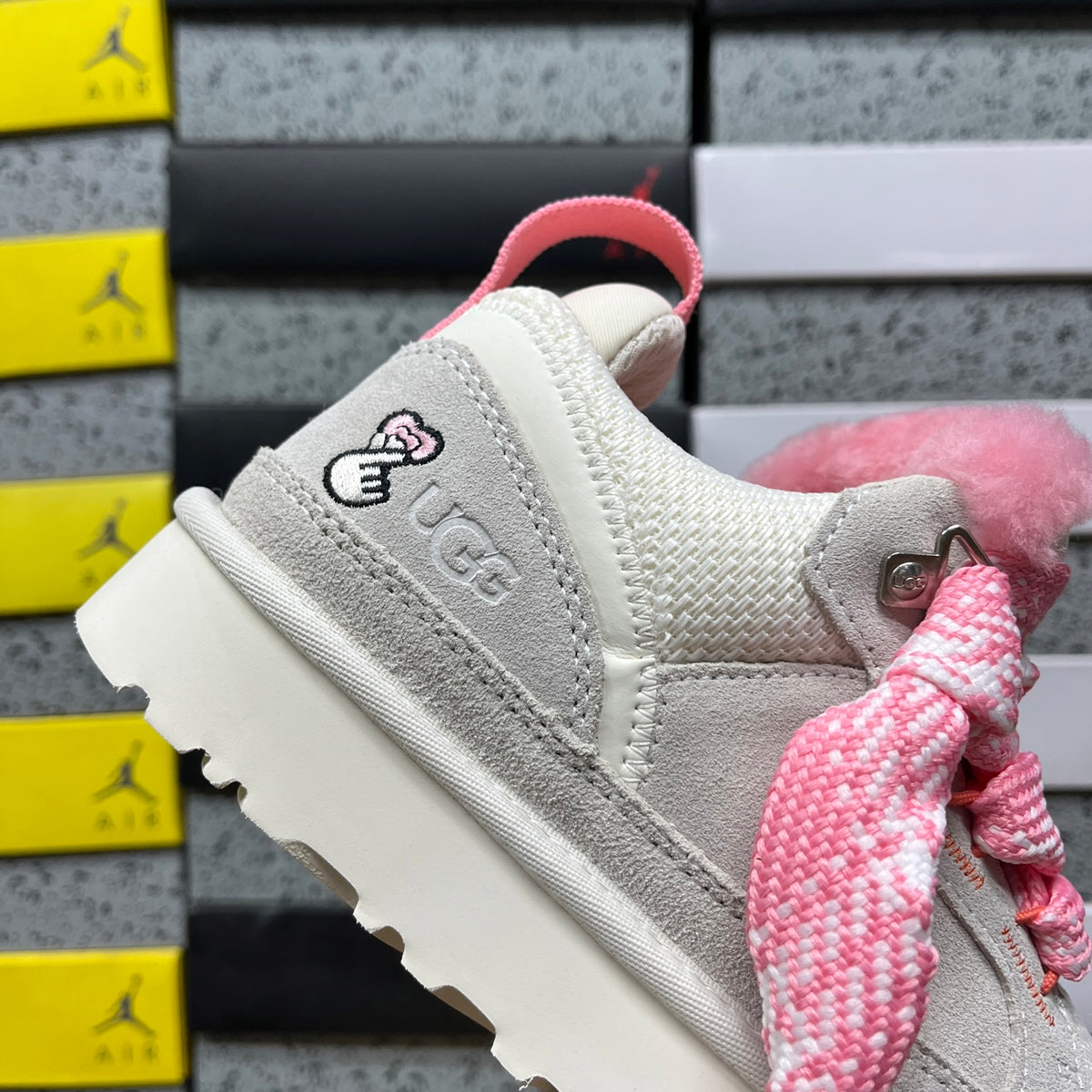 UGG Lowmel Sneaker – Cream Suede with Fluffy Pink Laces & Pompom Charm